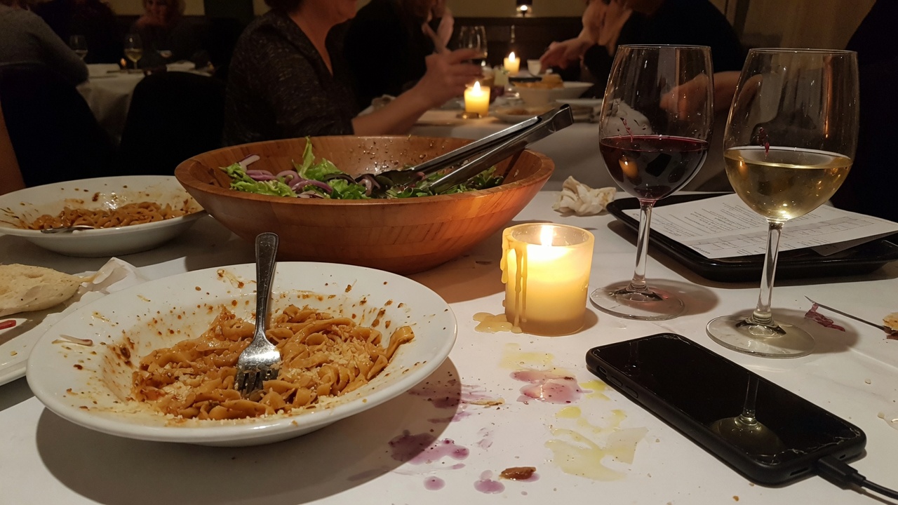 A real restaurant table after the first course